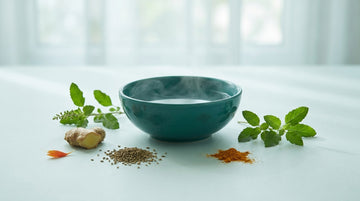 Wet cough remedies — a steaming bowl with tulsi, ginger, ajwain and turmeric for a cough with phlegm